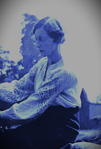 Irene Mawer, sitting.