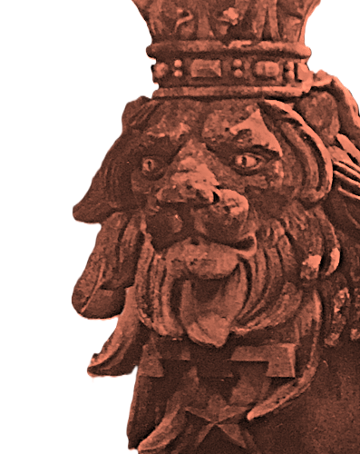 photo of a statue of a lion, carved in stone, wearing a coronet.